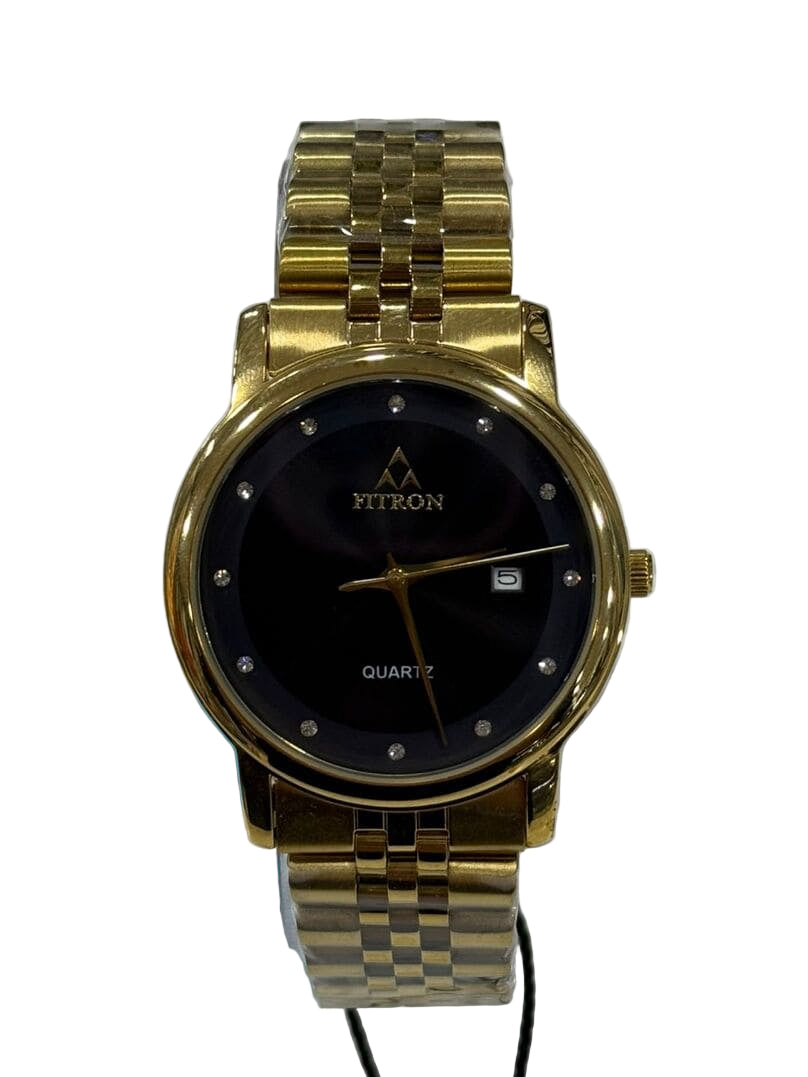 Gold wristwatch with black face on a white background